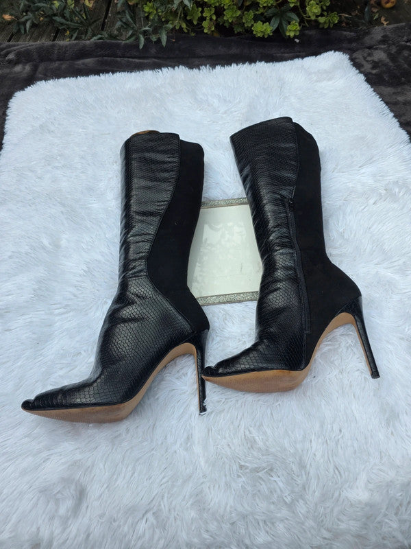 A Aldo knee high boots size 7.5