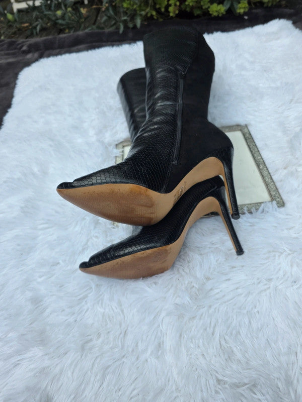 A Aldo knee high boots size 7.5