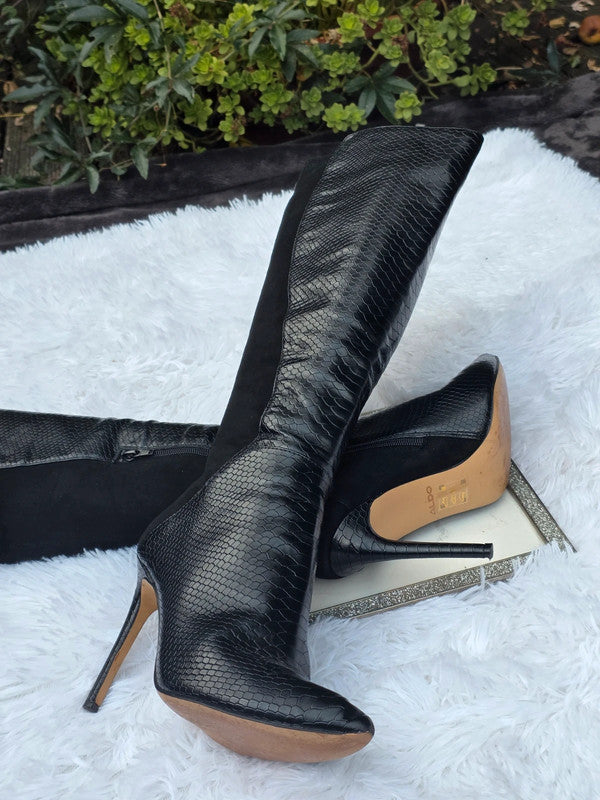 A Aldo knee high boots size 7.5