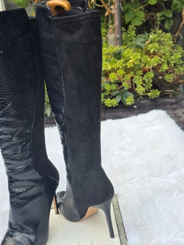 A Aldo knee high boots size 7.5