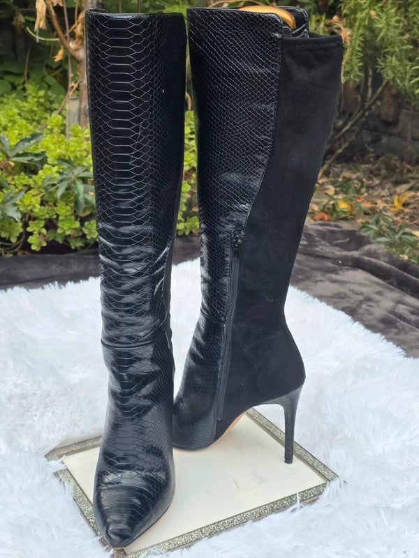 A Aldo knee high boots size 7.5