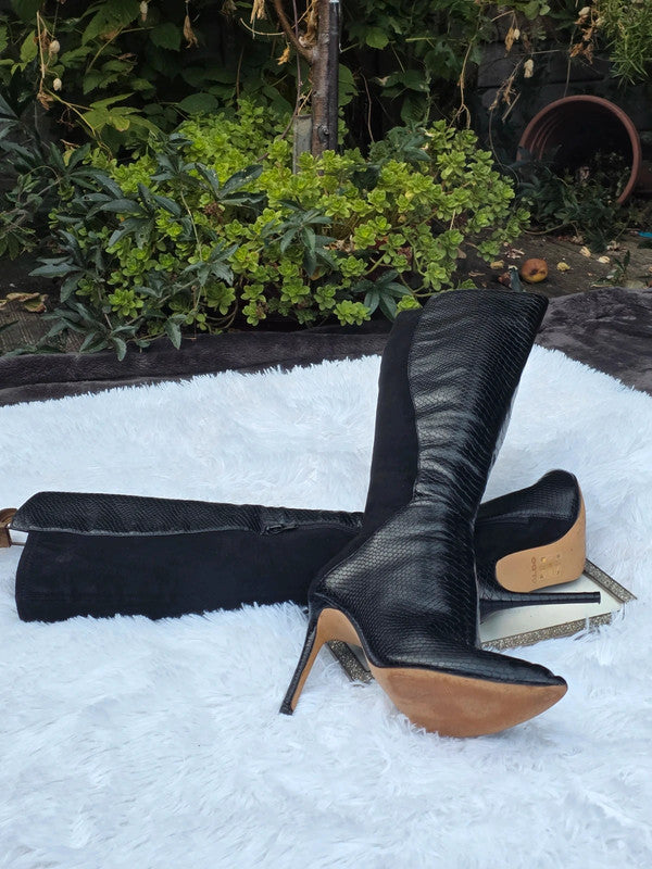 A Aldo knee high boots size 7.5