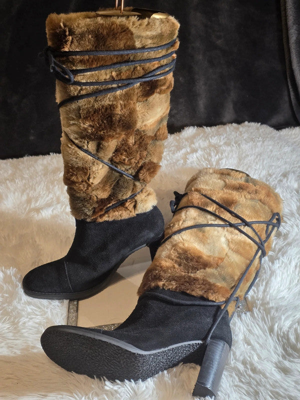 A Leather boots with faux fur size 6
