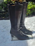 A Clarks leather knee-high boots size 7.5