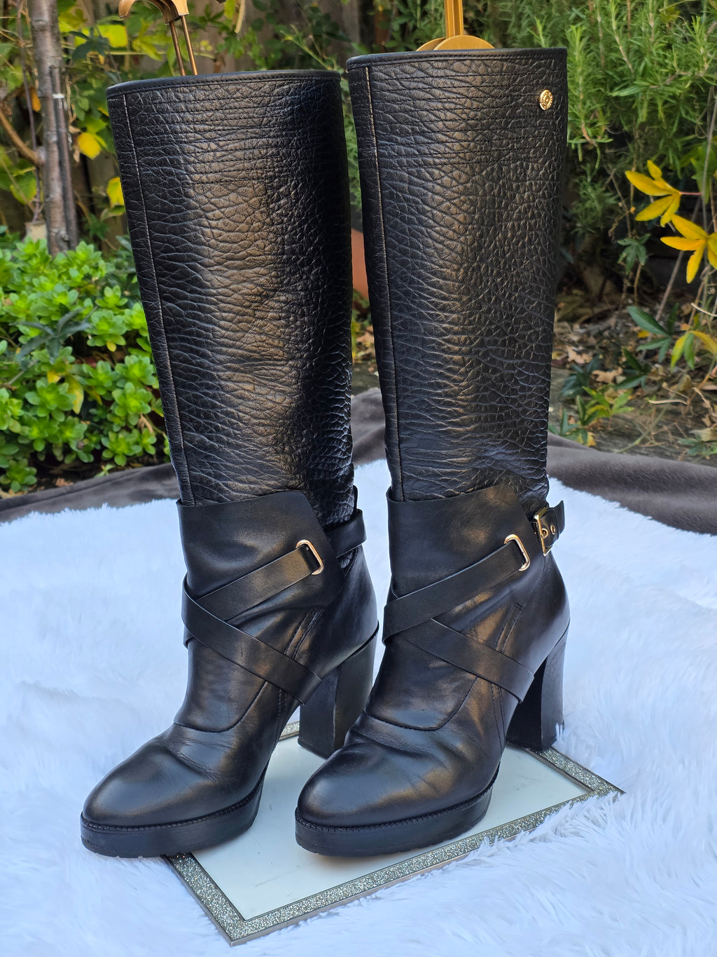 A Diesel knee-high leather boots size 6
