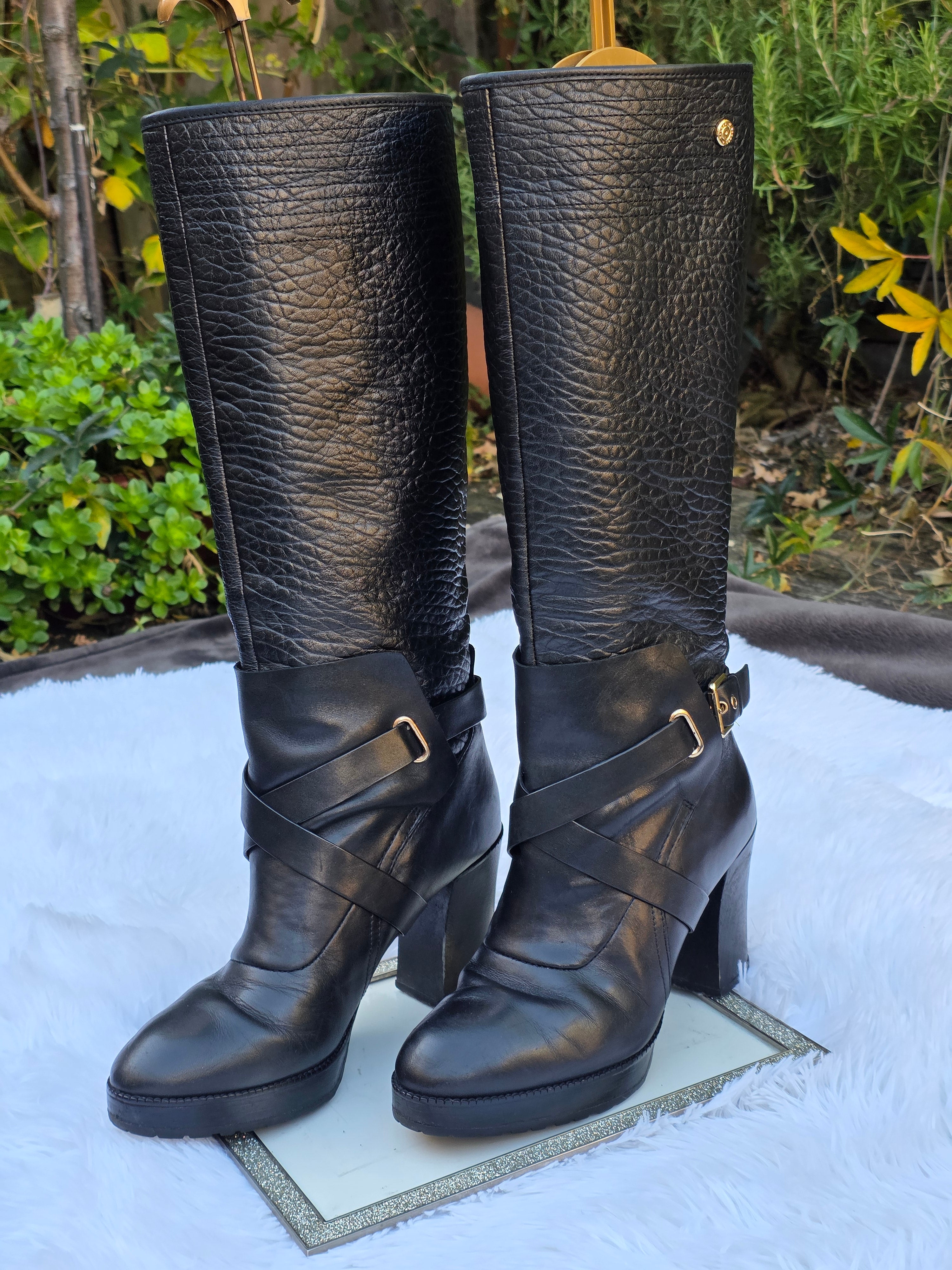 A Diesel knee-high leather boots size 6