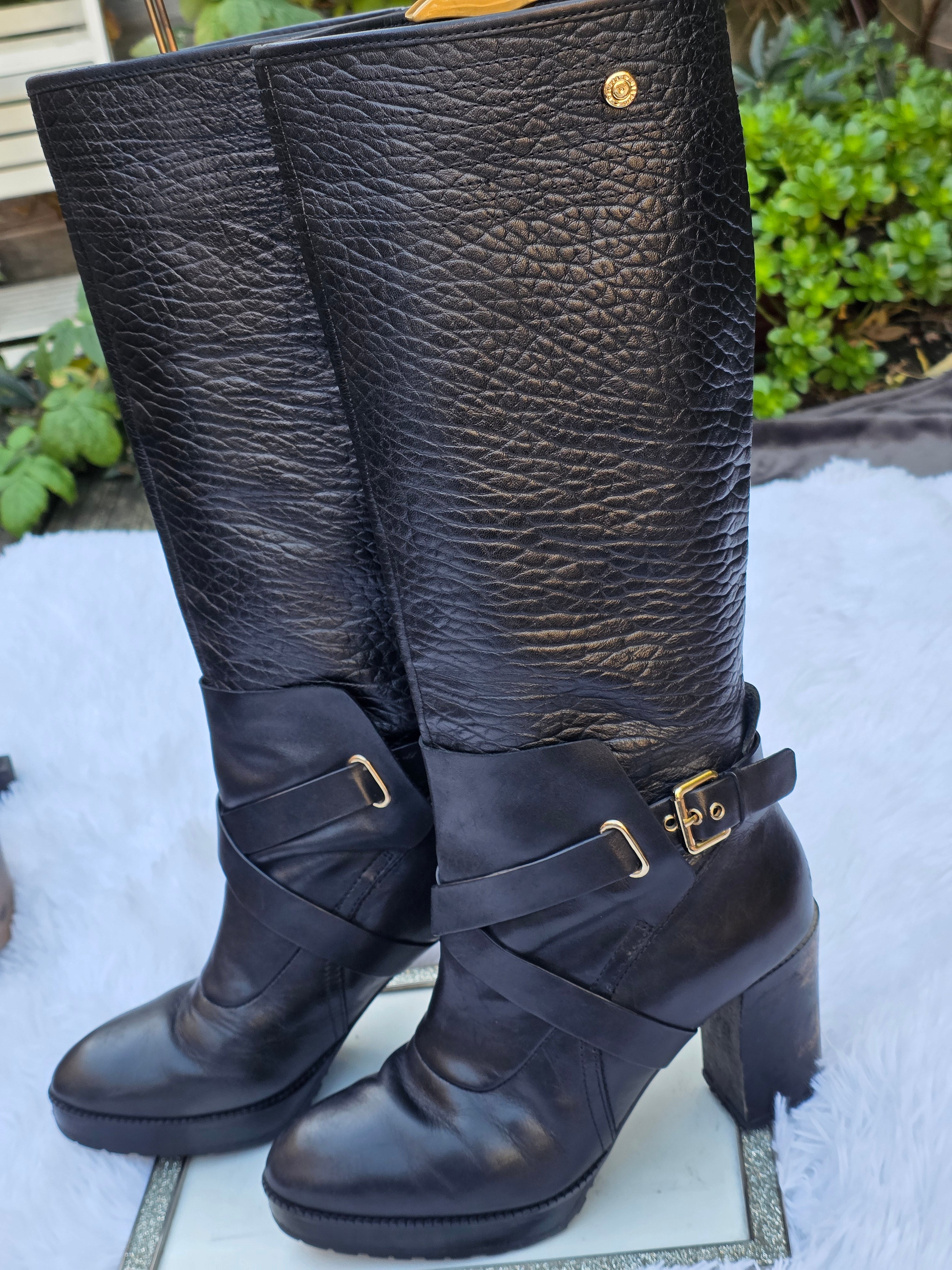 A Diesel knee-high leather boots size 6