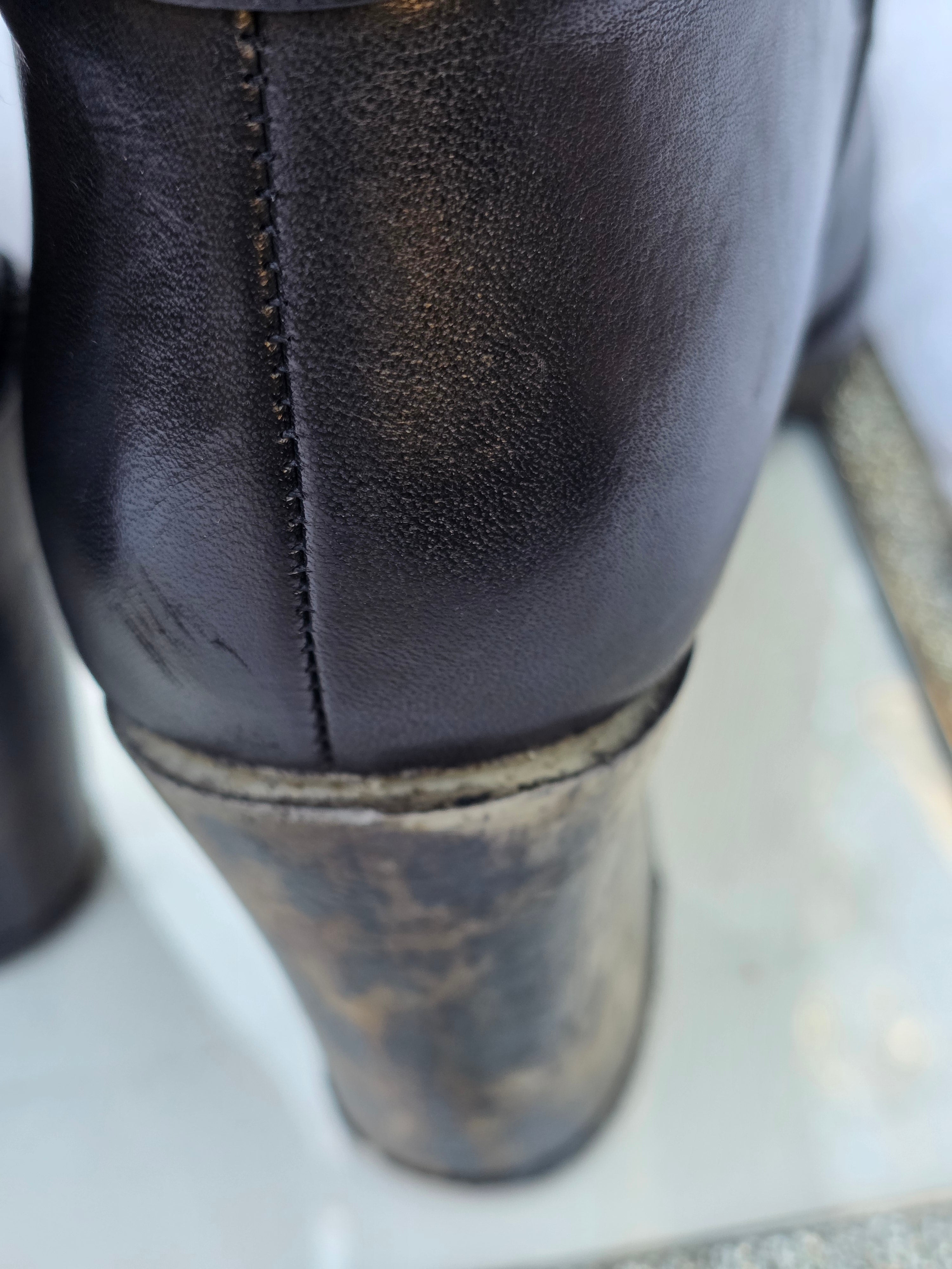 A Diesel knee-high leather boots size 6