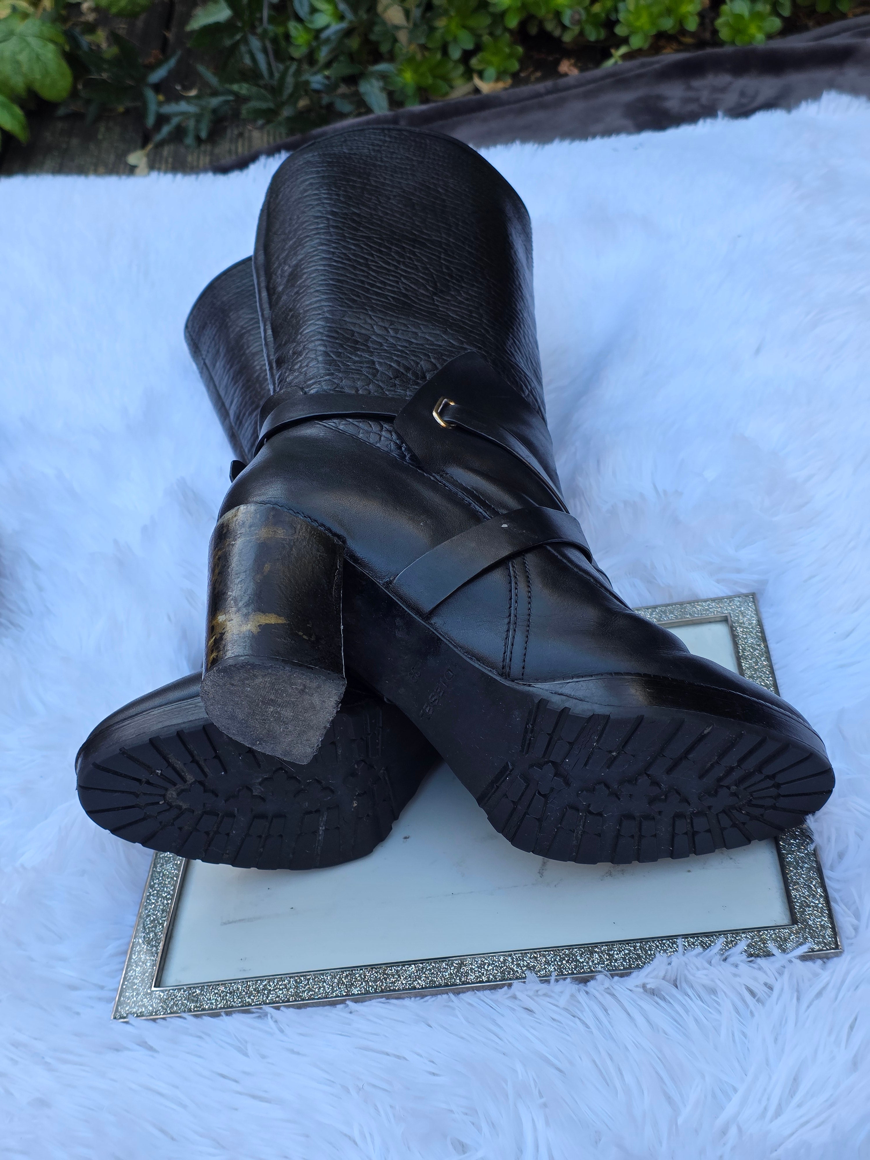 A Diesel knee-high leather boots size 6